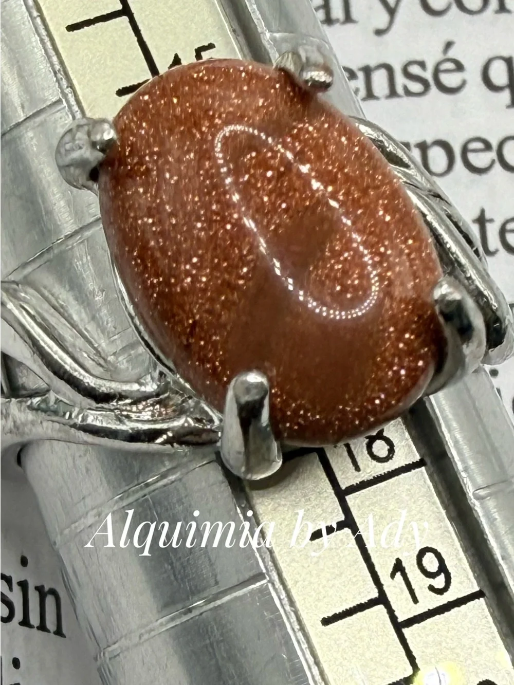 Sparkling Brown Goldstone Oval Ring in Silver-Tone Setting